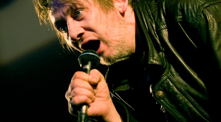 The Pogues frontman dies at 65