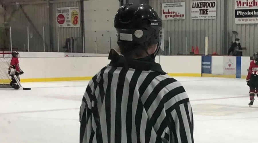 Hockey body reviewing discrimination penalty against coach