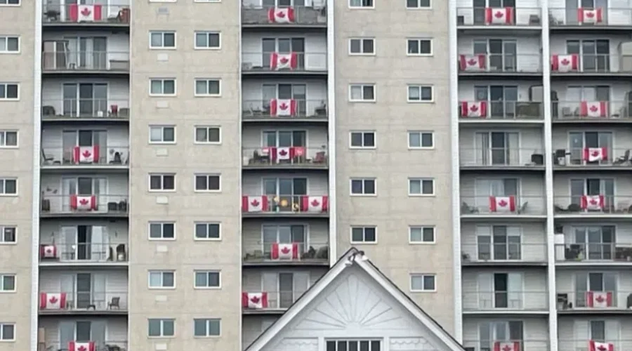 Residents At Winnipeg Apartment Building Showing Canadian Pride
