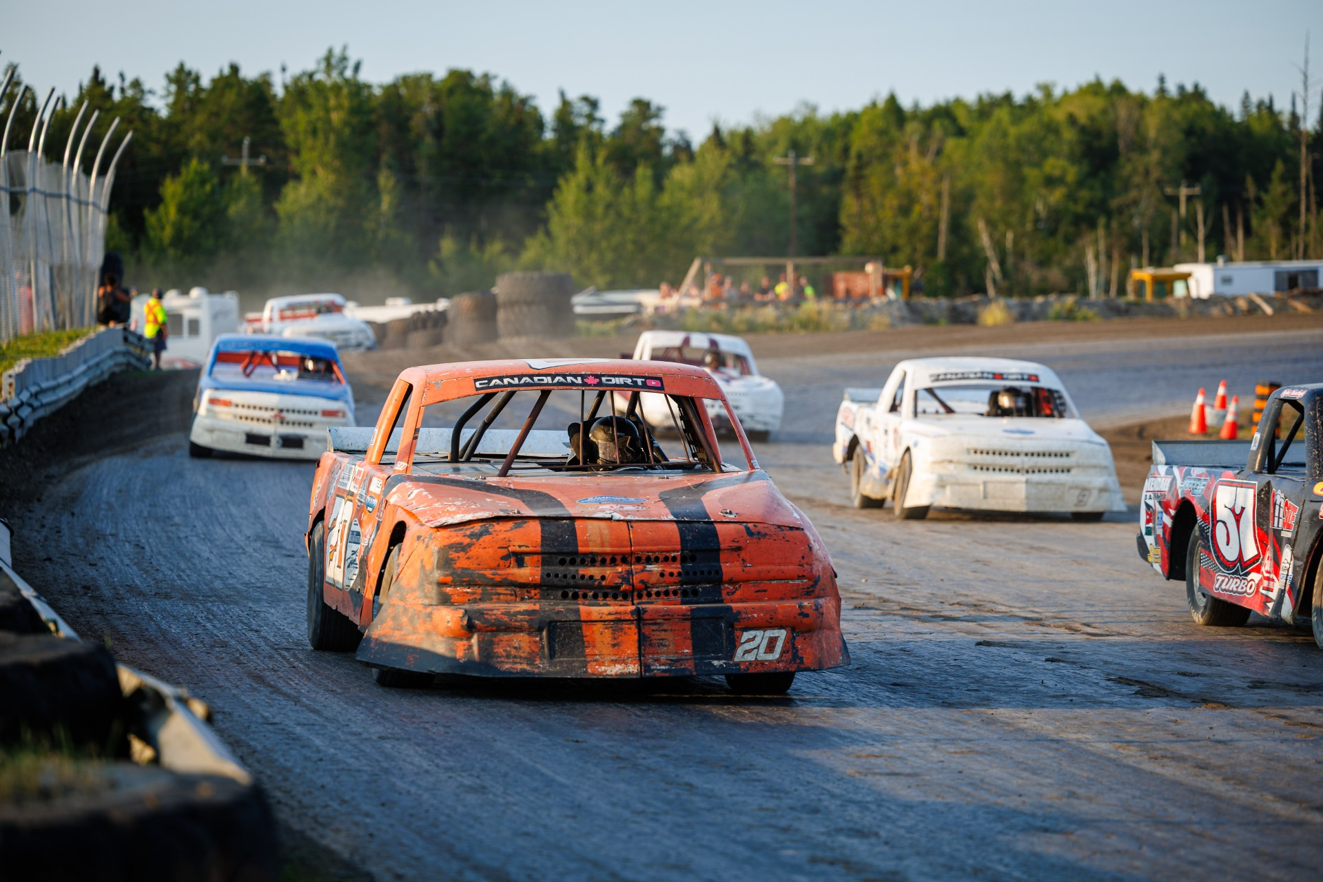 Winnipeg Super Trucks were a highlight class during the Dinner Jacket Classic Series. #20 Mercedes Krause of Ste. Adolphe, MB won both heat races, while #2 Chris Audette of Ste. Adolphe, MB and #10 Kyle Swaffer of Winnipeg , MB claimed feature wins. Audette won the Dinner Jacket Classic Series Championship as well. (Photo by Laurens Kaldeway)